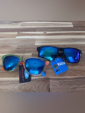 2 Oakley style kids Sunglasses polarized lenses. Not sure if authentic NWT